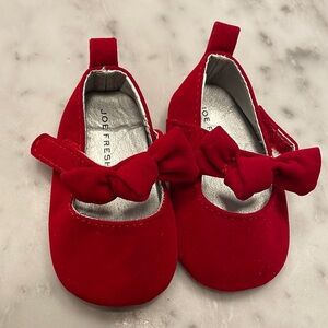 Red baby slippers
